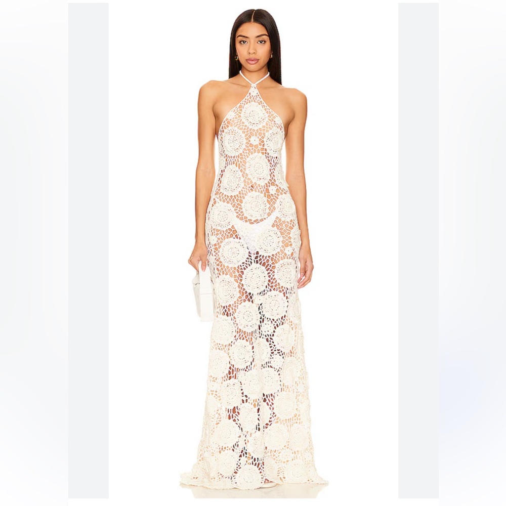 VESTIDO THALASSA FLORAL CROCHET
TULAROSA
Color: White